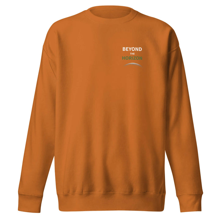Beyond the Horizon Unisex Premium Sweatshirt in orange color, featuring ribbed crew neck and long sleeves.