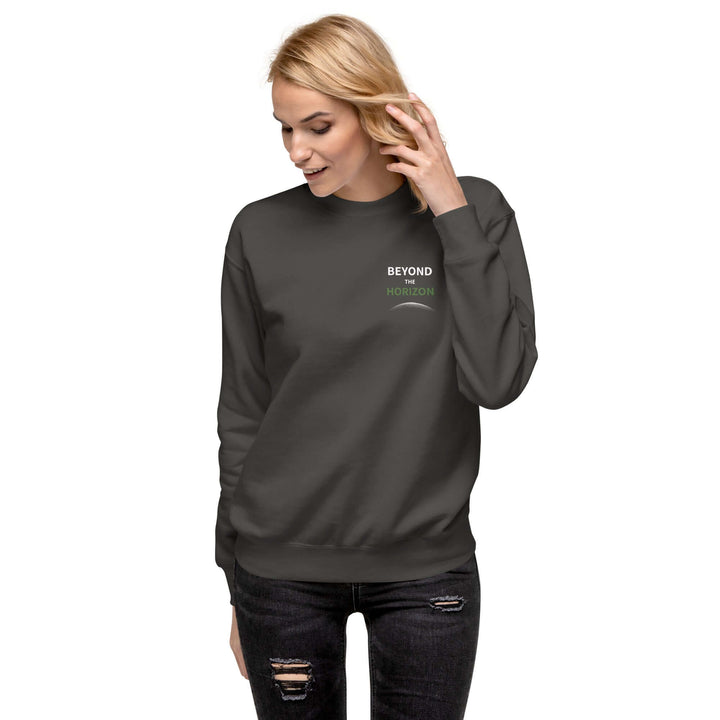 Beyond the Horizon Unisex Premium Sweatshirt displayed on a model wearing a dark sweatshirt with a modern design.